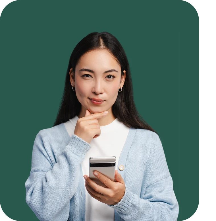 Thoughtful young woman holding her phone